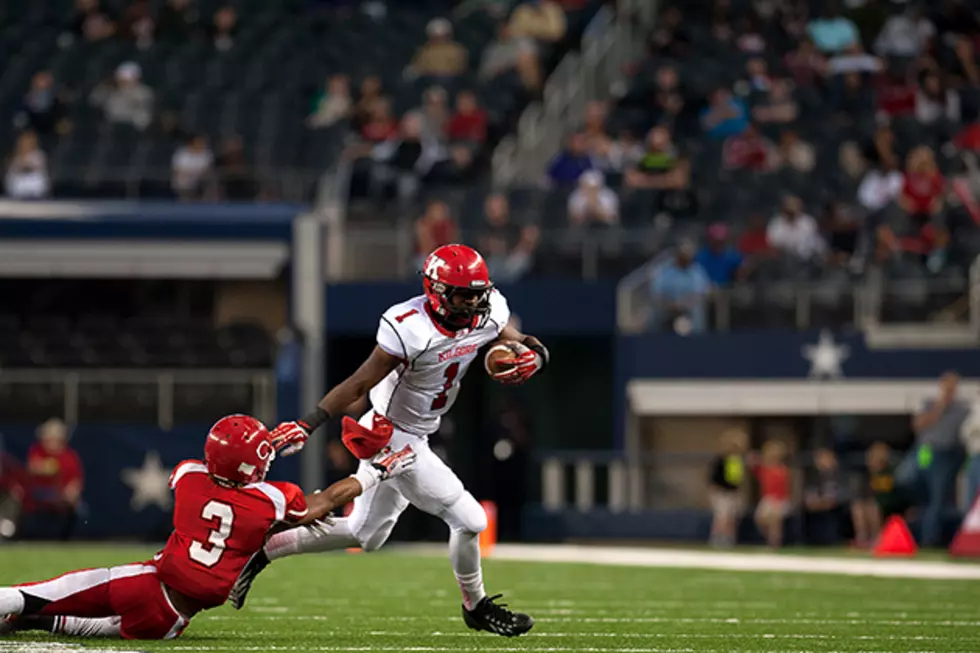Kilgore's Benny Colbert (1) hits the edge on a 32-yard touchdown run in Friday's 34-23 loss to Carthage in the Class 3A Division I state championship at AT&T Stadium in Arlington. (Christopher Vinn, ETSN.fm)