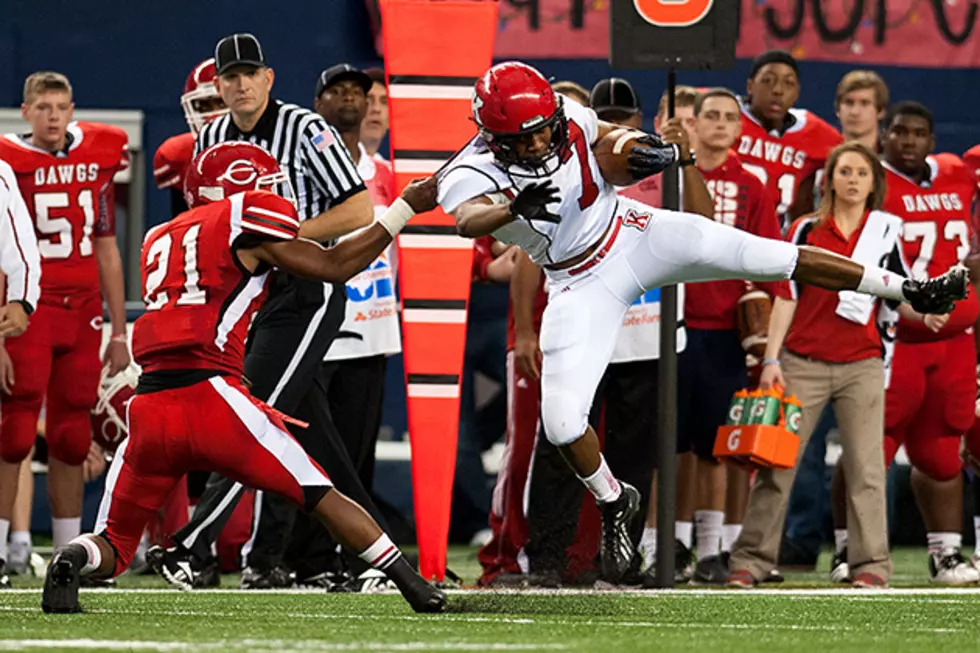 Carthage's Bryian Bolton (21) slings down Kilgore's Kevrin Justice during Carthage's 34-23 Class 3A Division I state championship win Friday at AT&T Stadium in Arlington. (Christopher Vinn, ETSN.fm)