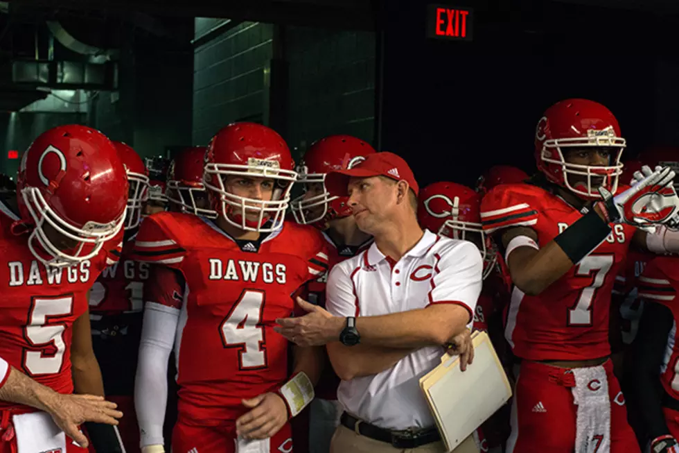 Carthage quarterback Blake Bogenschutz (4) and head coach Scott Surratt talk in the tunnel before taking the field in Friday's 34-23 Class 3A Division I state championship win over Kilgore at AT&T Stadium in Arlington. (Christopher Vinn, ETSN.fm)