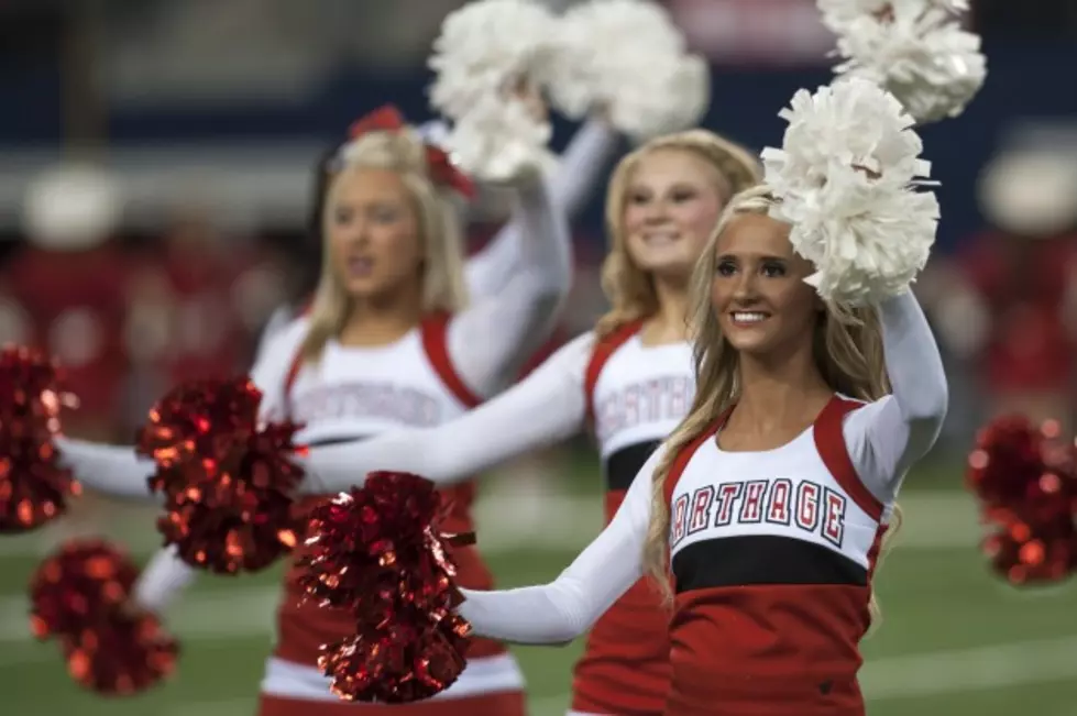 Carthage cheerleaders rev up their crowd during Friday's 34-23 Class 3A Division I state championship win vs. Kilgore at AT&T Stadium in Arlington. (Christopher Vinn, ETSN.fm)