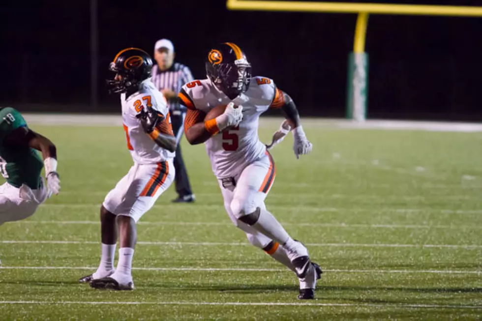 Gilmer's Demarco Boyd runs past Tatum defenders for a touchdown during the Buckeyes' 41-35 win at Tatum on Friday night. (Mark Martin, ETSN.fm)