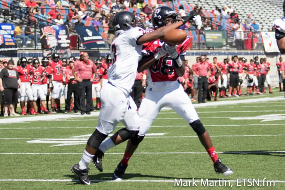 Gladewater's Isaiah Davis (left) breaks up a pass intended for Bossier City Parkway's Terrace Marshall during their game Saturday in Shreveport, La.