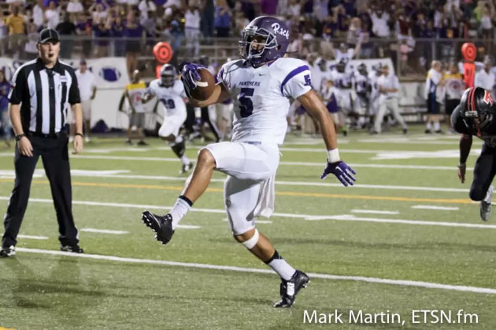 Lufkin's Dhailon Phillips scores a fourth-quarter touchdown during the Panthers' 52-49 overtime win over Tyler Lee on Friday night in Tyler.
