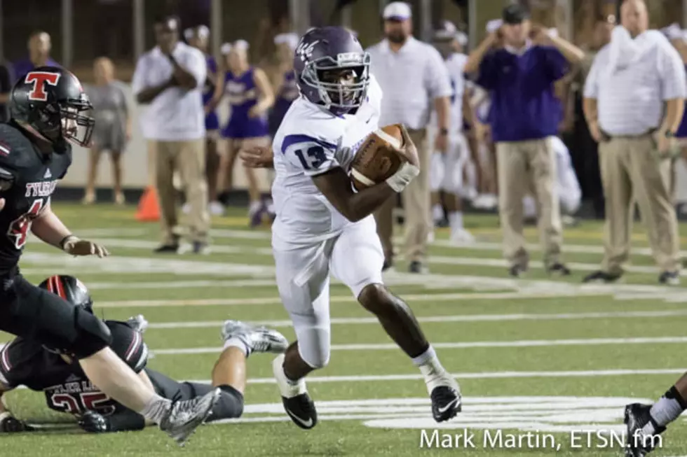 Lufkin quarterback Kordell Rodgers finds running room during the Panthers' 52-49 overtime win over Tyler Lee on Friday night in Tyler.