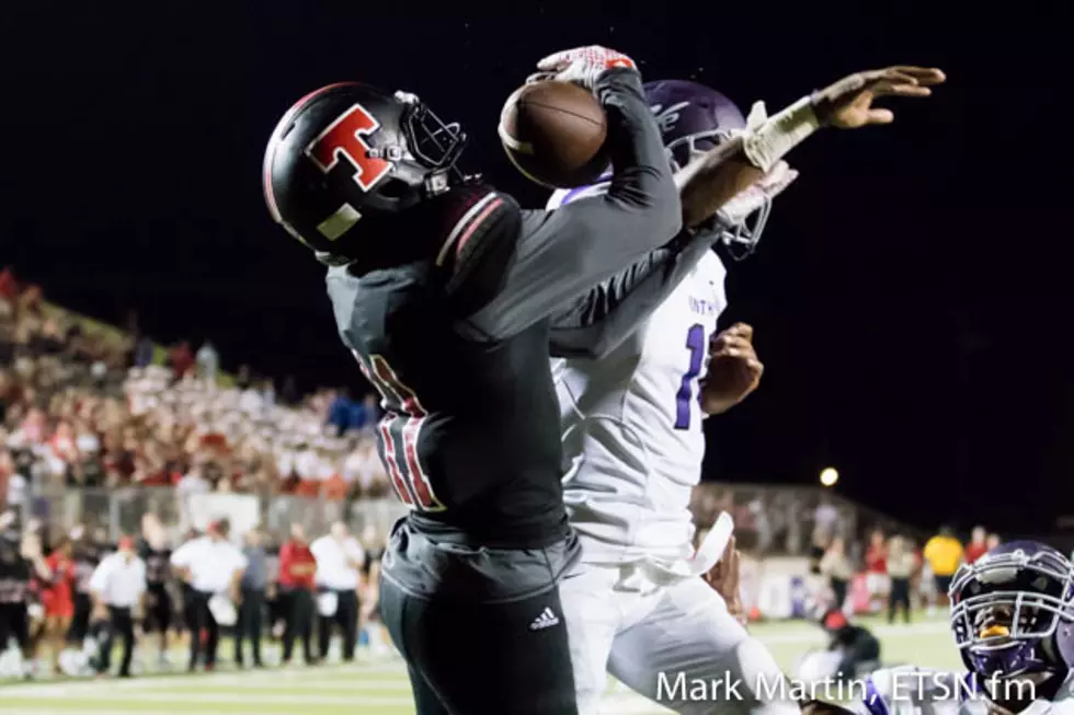 Lufkin's LaVonte White (right) breaks up a pass in the end zone intended for Tyler Lee's Isjuwan Barker on fourth down in overtime to seal Lufkin's 52-49 win Friday night in Tyler.