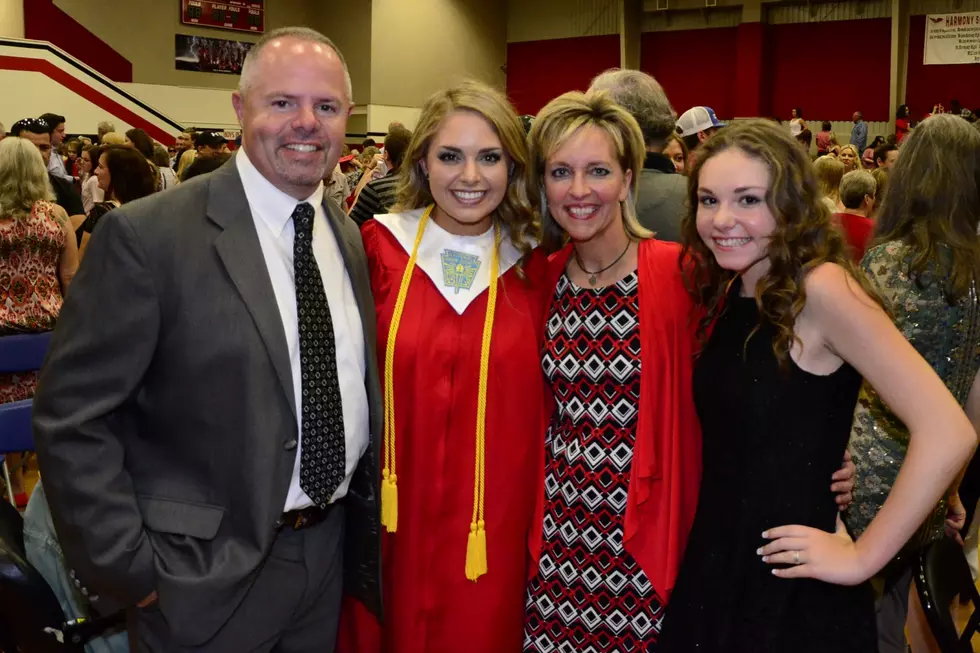 Bailee Russell (second from left) with her family after her graduation from Harmony in June 2016.